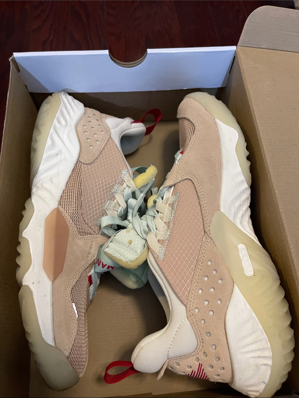 Jump Man Beige and Cream Athletic Sneakers with Red Pull Tab